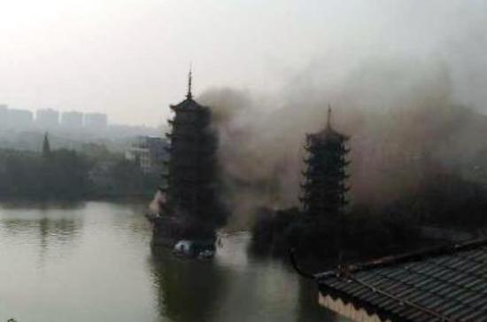 guilin pagoda on fire sun and moon tourist attraction